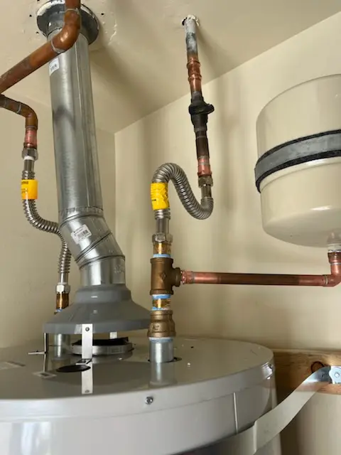 Water heater installation and plumbing repair in Charming Forge